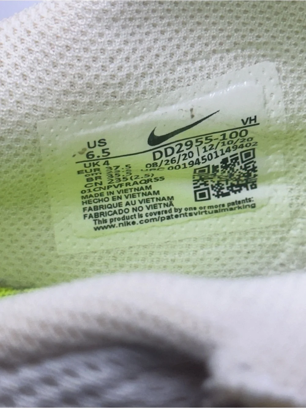 Nike Kids White Sneakers with Neon Yellow and Pink Accents